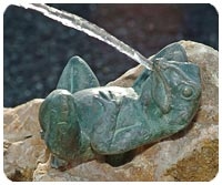 Impressionen von Wasserspielen mit Figur
